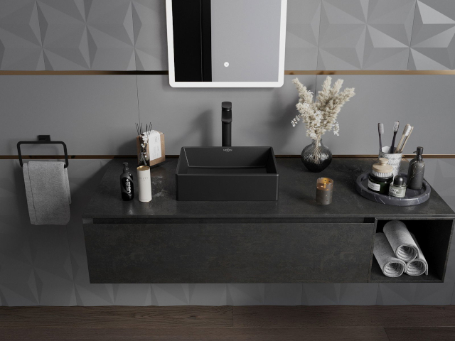 Armário preto estiloso sob lavatório em decoração de casa de banho